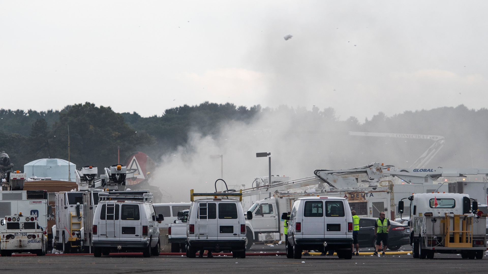 Emergency crews respond to a World War II B-17 bomber crash that happened just before 10 a.m. Wednesday at Bradley International Airport in Windsor Locks.