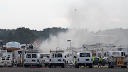 Emergency crews respond to a World War II B-17 bomber crash that happened just before 10 a.m. Wednesday at Bradley International Airport in Windsor Locks. Emergency crews respond to a World War II B-17 bomber crash that happened just before 10 a.m. Wednesday at Bradley International Airport in Windsor Locks.