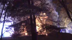 Two Center County, MO, firefighters were injured early Thursday after falling into a pit while battling a fire at heating oil supplier's shed.