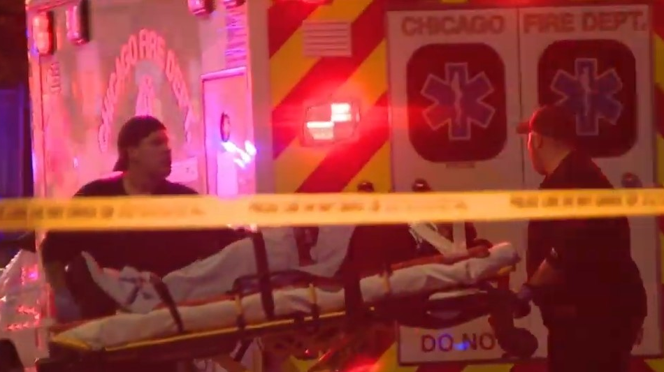 A Chicago ambulance colided with a police car late Saturday while both units were responding to a fatal shooting on the city's West Side.