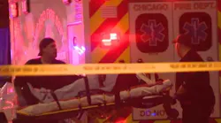 A Chicago ambulance colided with a police car late Saturday while both units were responding to a fatal shooting on the city's West Side.