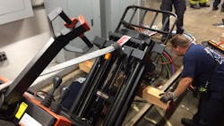 Chicago firefighters used the jaws of life to save a construction worker who was critically injured when he was pinned beneath a forklift late Monday. Chicago firefighters used the jaws of life to save a construction worker who was critically injured when he was pinned beneath a forklift late Monday.