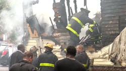 Three Detroit firefighters were taken to the hospital Thursday after they were in a house that collapsed while battling a fire.