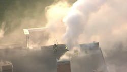 Detroit firefighters battled a two-alarm blaze at a vacant school Thursday that the deputy fire commissioner said was &apos;a tough fire to fight.&apos;
