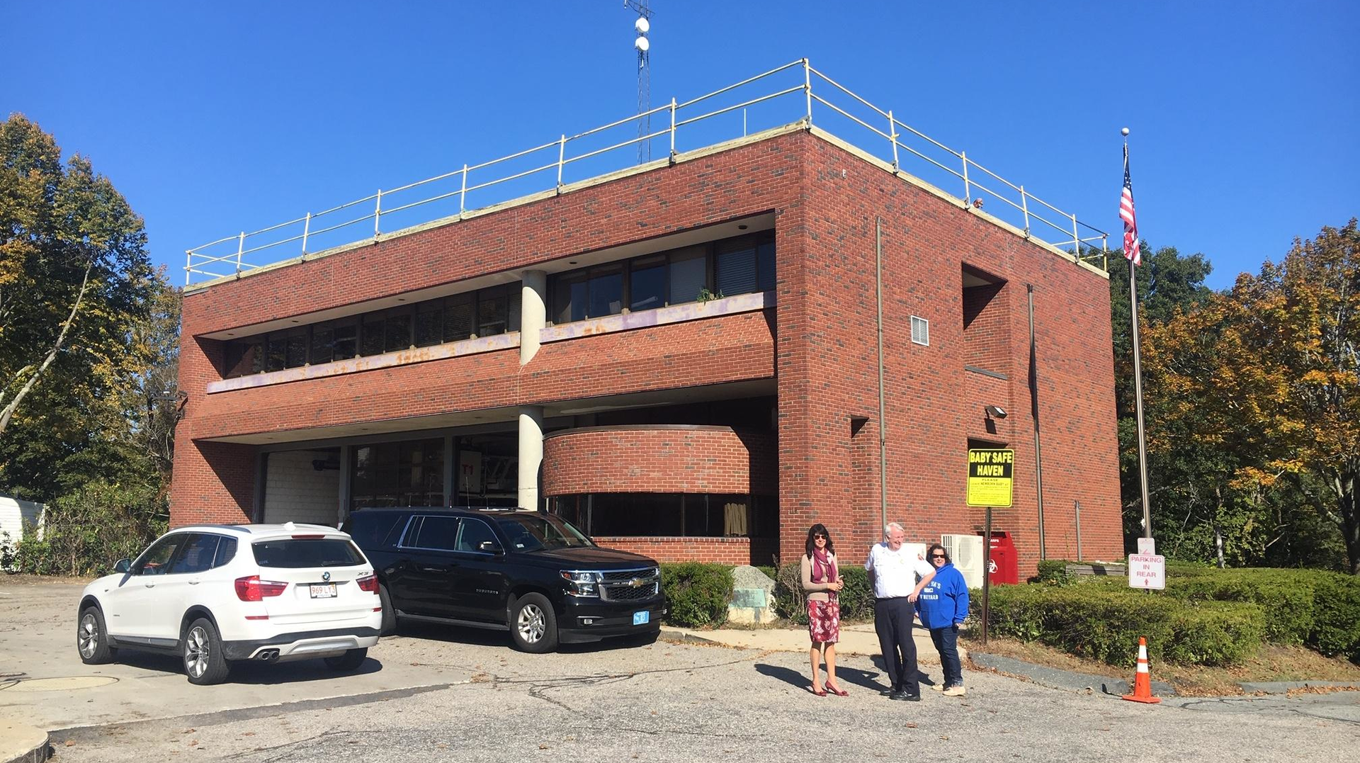 Plymouth, MA, Town Manager Melissa Affighi (left), Fire Chief Ed Bradley and Select Person Betty Cavacco examine Fire Station 1 on Tuesday.