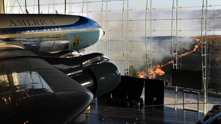 President Ronald Reagan's Air Force One sits on display at the Reagan Library as the Easy fire burns in the hills in Simi Valley, CA, on Wednesday.