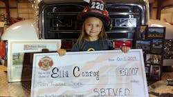 Ella Conroy, 6, shows off a check for the $30,007 raised by the South Buffalo, PA, Fire Department. Ella Conroy, 6, shows off a check for the $30,007 raised by the South Buffalo, PA, Fire Department.