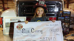 Ella Conroy, 6, shows off a check for the $30,007 raised by the South Buffalo, PA, Fire Department. Ella Conroy, 6, shows off a check for the $30,007 raised by the South Buffalo, PA, Fire Department.