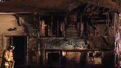 A Stratham, NH, man carrying a knife and a machete confronted firefighters responding to a three-alarm fire at his home Thursday. A Stratham, NH, man carrying a knife and a machete confronted firefighters responding to a three-alarm fire at his home Thursday.