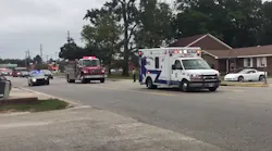 First responders escort the body of White Lake, NC, firefighter Mildred Gray Williams, who died in a construction accident Tuesday.