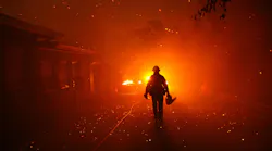The Woolsey fire burns homes in Malibu, CA, on Nov. 9, 2018.