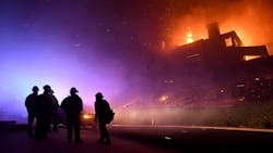 Firefighters monitor a house fully engulfed on Mountain Crest Circle in Thousand Oaks, CA, in April 2019. Firefighters monitor a house fully engulfed on Mountain Crest Circle in Thousand Oaks, CA, in April 2019.