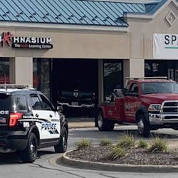 A woman suffered a medical emergency while behind the wheel of a pickup truck Friday, crashing through a vacant strip mall store in Schererville, IN.