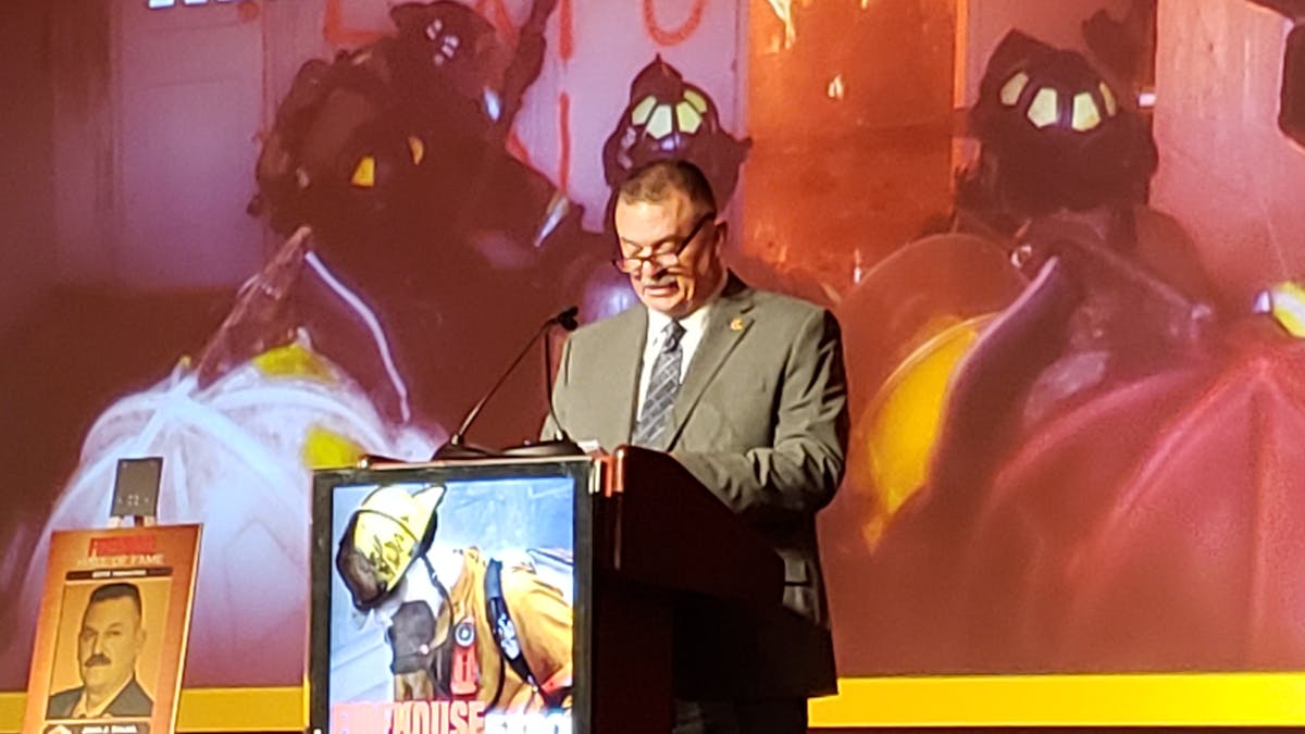 Retired FDNY Battalion Chief John Salka makes remarks after being inducted into Firehouse&apos;s Hall of Fame.