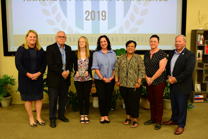 Left to Right: Dayna Fuller, director of instructional design technology; John Willey, Ph.D., dean of faculty development, services and support; Jackie Pica, instructional designer II; Carey Smouse, Blackboard, Inc., account executive; Freda Braddock, Ed.D., program director, behavioral science & orientation; Cheryl Kula, instructional designer II; Kenneth Styron, president, Columbia Southern University.