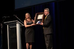 Barbara Marzean, regional director of VFIS of Texas, presented Troy Markel, president of VFIS, with a proclamation from the Lone Star State commemorating the company’s landmark milestone. Barbara Marzean, regional director of VFIS of Texas, presented Troy Markel, president of VFIS, with a proclamation from the Lone Star State commemorating the company’s landmark milestone.