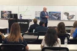 Phil Burks, FIRST iZ and attendees of the event. Phil Burks, FIRST iZ and attendees of the event.