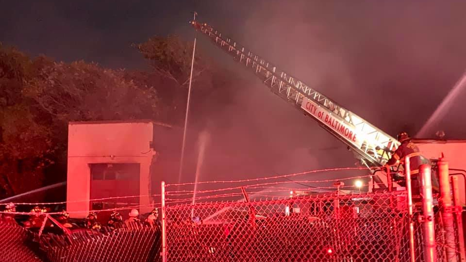 Two Baltimore City firefighters were injured while battling a two-alarm blaze Monday.