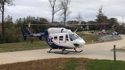 A man who was trapped in a tree was airlifted Wednesday to a St. Louis hospital after Belleville, IL, firefighters used a battery-operated tool spreader to free him.