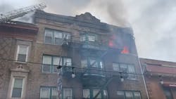 A firefighter and police officer were injured responding to a three-alarm apartment blaze Thursday in Bloomfield, NJ.