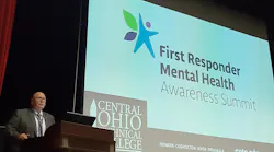 Kevin Reardon, a former firefighter with the Columbus, OH, Division of Fire and director of Central Ohio Technical College's Institute for Public Safety in Newark, welcomes about 130 attendees Wednesday to the First Responder Mental Health Awareness Summit, where sessions addressed the traumas suffered by first responders.