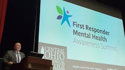 Kevin Reardon, a former firefighter with the Columbus, OH, Division of Fire and director of Central Ohio Technical College&apos;s Institute for Public Safety in Newark, welcomes about 130 attendees Wednesday to the First Responder Mental Health Awareness Summit, where sessions addressed the traumas suffered by first responders.
