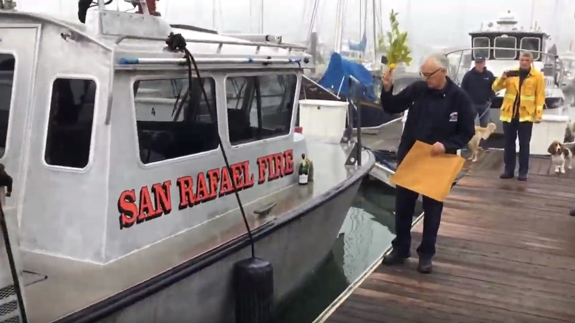 San Rafael, CA, Fire Chief Christopher Gray christens Saturday the department's newest fire boat, the 34-foot 'Fire Boat San Rafael,' which replaces the fledgling marine response program's former vessel 'Confidence.'