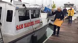 San Rafael, CA, Fire Chief Christopher Gray christens Saturday the department's newest fire boat, the 34-foot 'Fire Boat San Rafael,' which replaces the fledgling marine response program's former vessel 'Confidence.'