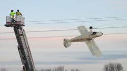 Shakopee, MN, firefighters rescue a pilot whose airplane became entangled in live electrical wires Saturday in Scott County.