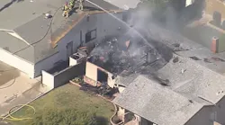 San Bernardino County, CA. firefighters battled a blaze Thursday at a single-story Upland home after a small airplane reportedly crashed into it.