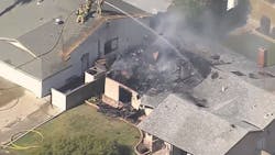 San Bernardino County, CA. firefighters battled a blaze Thursday at a single-story Upland home after a small airplane reportedly crashed into it.