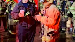 Dallas Assistant Chief Justin Ball (left) and Operations Chief Charlie Salazar at the scene of damage following a tornado that touched down in the Dallas-Fort Worth area Oct. 20, 2019.