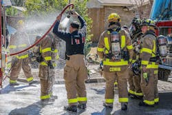Grand Prairie, TX, Fire Department crew are required to go through mandatory personal exposure reduction (decon) with the department&rsquo;s decon system to immediately stop the off-gassing of PPE.