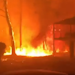 Dramatic video from an Australian firefighter shows flames from a brushfire threatening homes Blackheath valley Saturday.