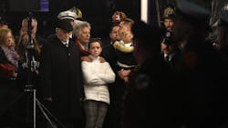 A memorial honoring fallen Worcester, MA, firefighter Christopher Roy was unveiled on Monday at the Webster Square Fire Station as his daughter, Ava, looks on.