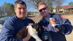 Clayton, NC, firefighters used a cutting tool Thursday to free a cat whose head was stuck in a pasta can.