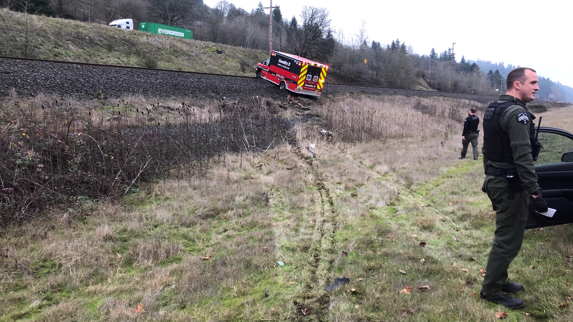 Police use spike strips to stop the Cowlitz 2 Fire & Rescue ambulance following a pursuit.