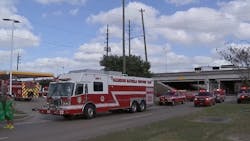 Houston firefighters cleaned up a city intersection after a mercury spill was discovered Sunday. Houston firefighters cleaned up a city intersection after a mercury spill was discovered Sunday.