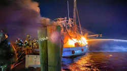 Fire engulfs one of the Mayport shrimp boats as Jacksonville, FL, firefighters battle the blaze.