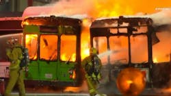 Firefighters battled flames after two empty passenger buses caught fire at Los Angeles International Airport on Saturday night. Firefighters battled flames after two empty passenger buses caught fire at Los Angeles International Airport on Saturday night.