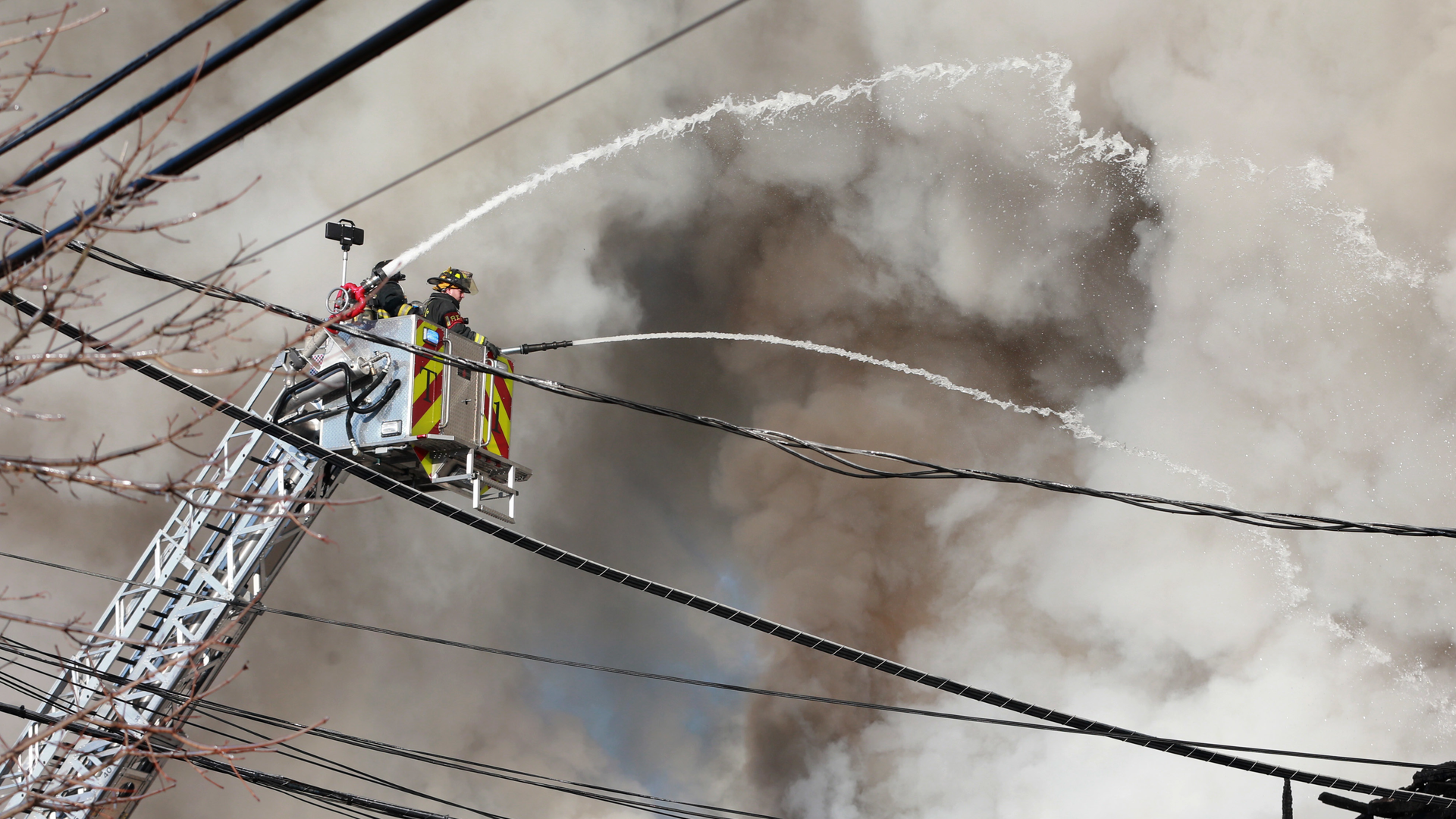 Netcong, NJ, firefighters battled a massive three-alarm blaze that collapsed a three-story building early Sunday.
