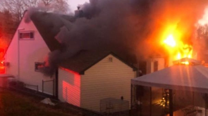 A former Penndel-Middletown, PA, Emergency Squad chief was injured when his house caught fire Saturday.