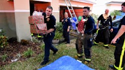 Polk County, FL, firefighters were able to save a family's Christmas tree and gifts from a house fire in Mulberry on Saturday. Polk County, FL, firefighters were able to save a family's Christmas tree and gifts from a house fire in Mulberry on Saturday.