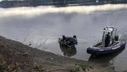 Polusbo, WA, firefighters rescued a couple who were trapped in their vehicle after it crashed into Liberty Bay on Saturday. Polusbo, WA, firefighters rescued a couple who were trapped in their vehicle after it crashed into Liberty Bay on Saturday.
