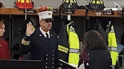 New Groveland, MA, Fire Chief Robert Valentine is sworn in during a ceremony Dec. 1.