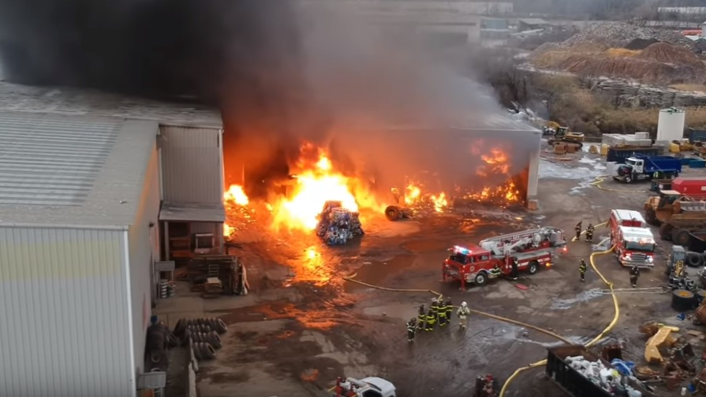 Firefighters respond to a massive, multi-alarm blaze that broke out Monday afternoon at a recycling plant in Woodbridge Township, NJ.