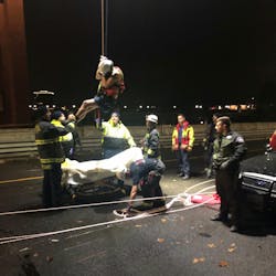 Spokane, WA, firefighters rescued a man who was trapped 80 feet below a bridge at the edge of the Spokane River early Thursday. Spokane, WA, firefighters rescued a man who was trapped 80 feet below a bridge at the edge of the Spokane River early Thursday.