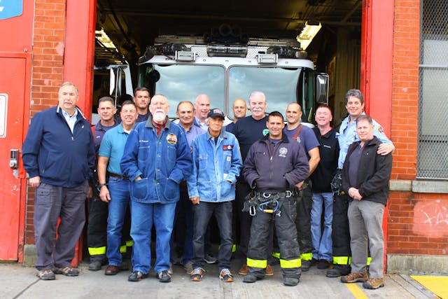 Current and former Rescue 2 firefighters during the &apos;Last Tour&apos; at the Brooklyn fire station on Nov. 3, 2019. On the right is Chicago Battalion Chief Pat Maloney and Rescue 2 Capt. Liam Flaherty.