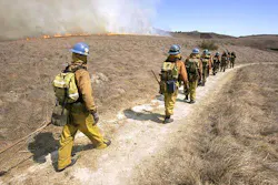 Los Angeles County firefighters work a wildfire. Los Angeles County firefighters work a wildfire.