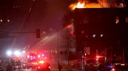 Fire shoots from the attic of the Francis Drake Hotel in downtown Minneapolis.